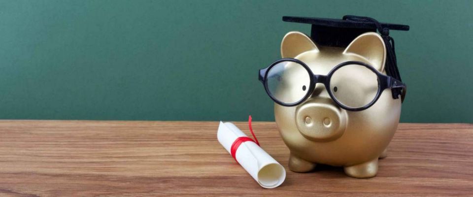 Piggy bank with grad cap