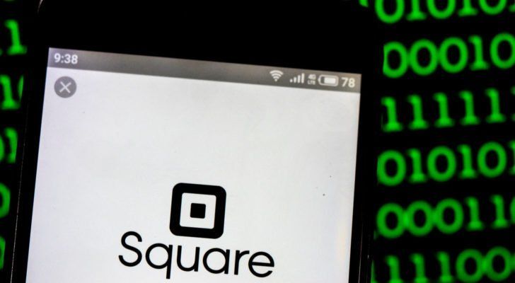 Square, Inc. (SQ) logo seen displayed on smart phone. Square, Inc. is a financial services, merchant services aggregator, and mobile payment company