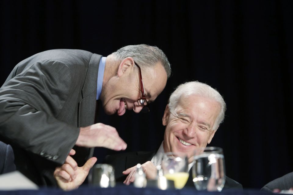 WASHINGTON - FEBRUARY 7:  U.S. Sen. Chuck Schumer (D-NY) and U.S. Vice President Joe Biden laugh during the National Prayer Breakfast at the Washington Hilton February 7, 2013 in Washington, DC. U.S. President Barack Obama reportedly used the occasion to call for unity and common ground Washington politics.   (Photo by Chris Kleponis-Pool/Getty Images)