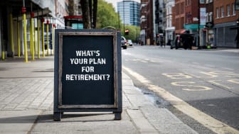 picture of a sign on a sidewalk saying &quot;What&#039;s Your Plan for Retirement?&quot;